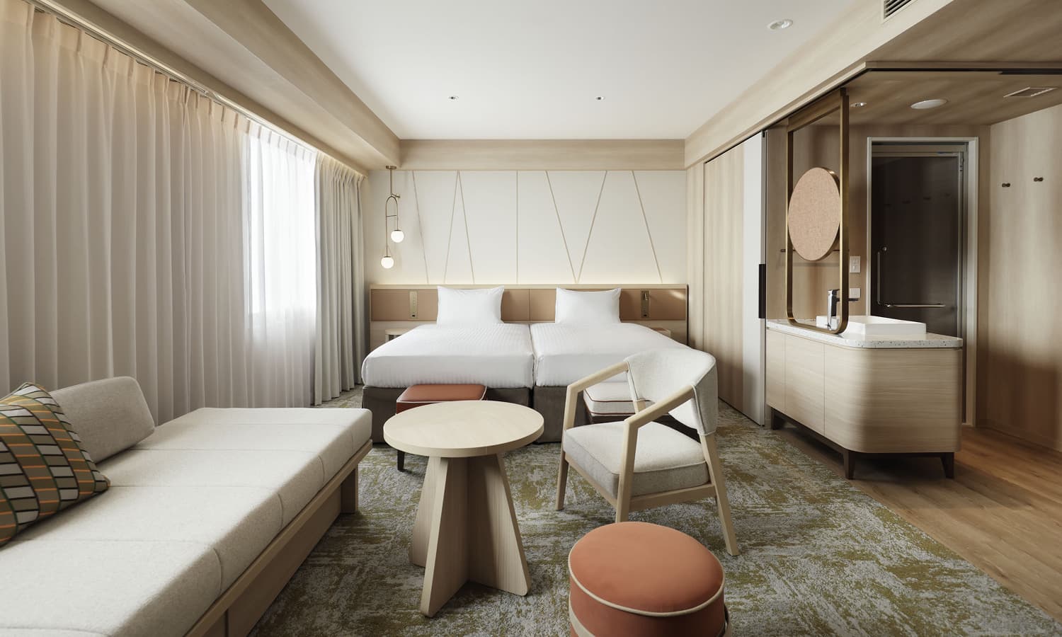 이그제큐티브 프리미어 트윈(+소파베드)룸에는 싱글 침대 2개, 소파베드, 미니멀한 목재 가구, 차분한 색조, 좌석 공간, 세련된 세면대가 있습니다.