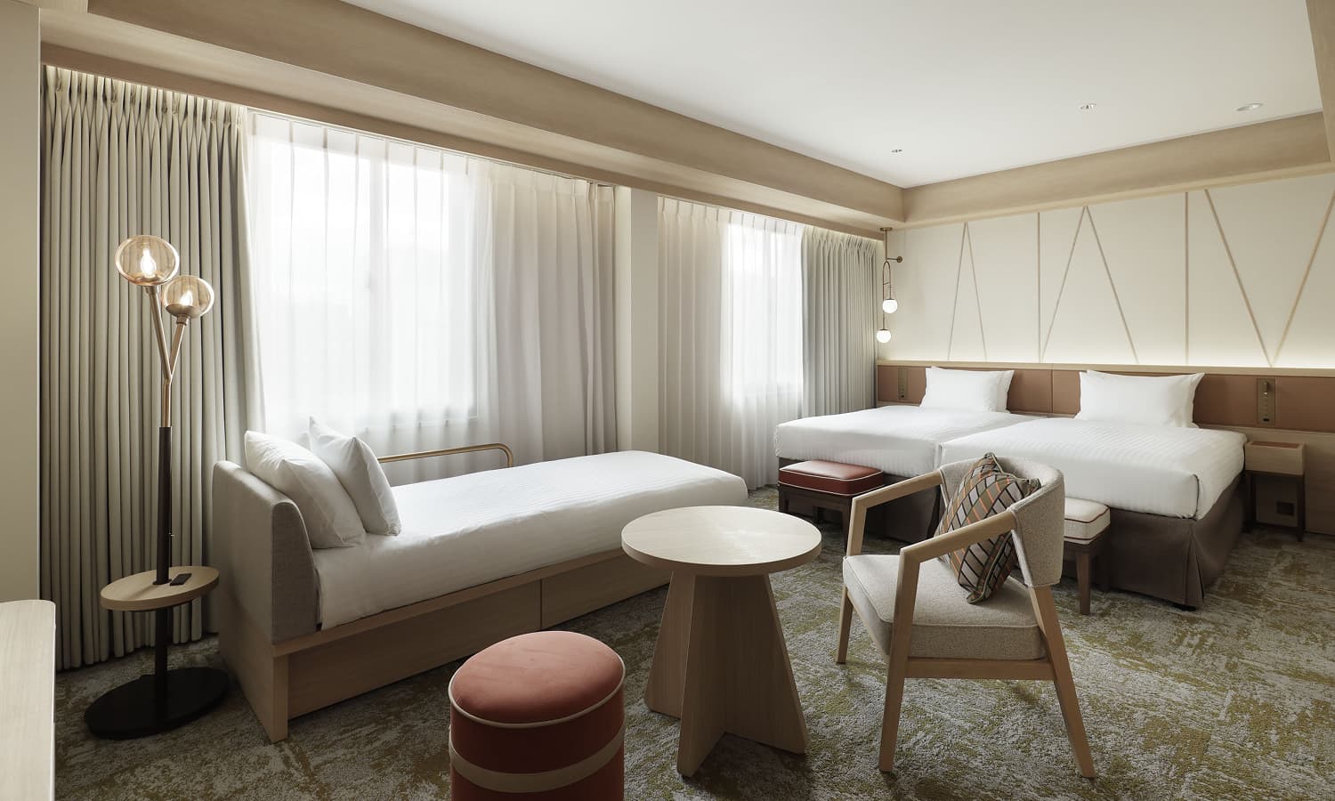 이그제큐티브 트윈(+소파베드)룸에는 싱글 침대 2개, 소파베드, 미니멀한 목재 가구, 차분한 색조, 좌석 공간, 넓은 창이 있습니다.